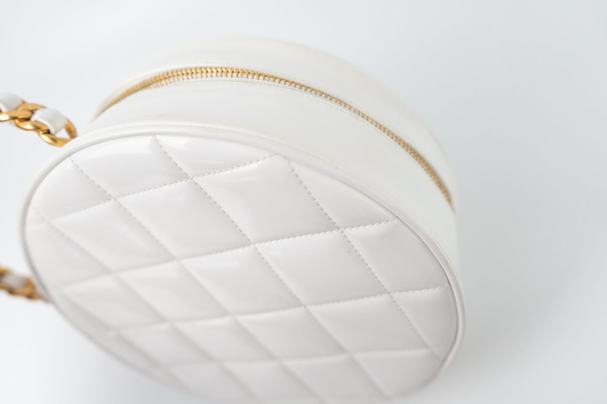 CHANEL Cosmetic Cases Vintage White Patent Leather Round Vanity Bag Gold Hardware - Redeluxe