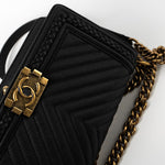 CHANEL Crossbody Black Caviar Chevron Boy Bag Medium Entwined Leather Aged Gold Hardware - Redeluxe