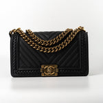 CHANEL Crossbody Black Caviar Chevron Boy Bag Medium Entwined Leather Aged Gold Hardware - Redeluxe