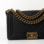 CHANEL Crossbody Black Caviar Chevron Boy Bag Medium Entwined Leather Aged Gold Hardware - Redeluxe