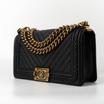 CHANEL Crossbody Black Caviar Chevron Boy Bag Medium Entwined Leather Aged Gold Hardware - Redeluxe