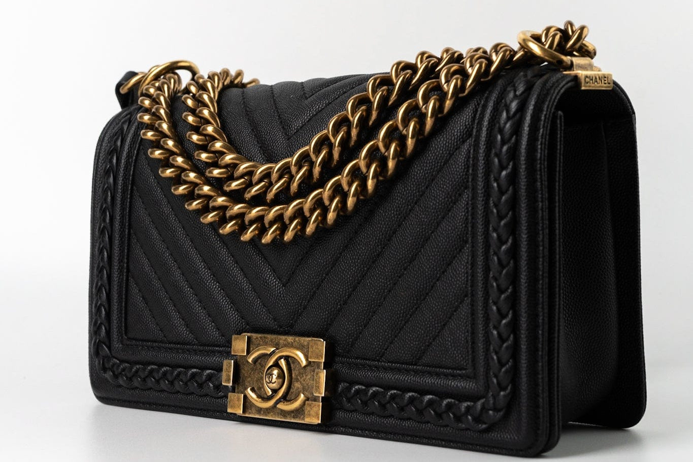 CHANEL Crossbody Black Caviar Chevron Boy Bag Medium Entwined Leather Aged Gold Hardware - Redeluxe