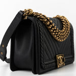 CHANEL Crossbody Black Caviar Chevron Boy Bag Medium Entwined Leather Aged Gold Hardware - Redeluxe