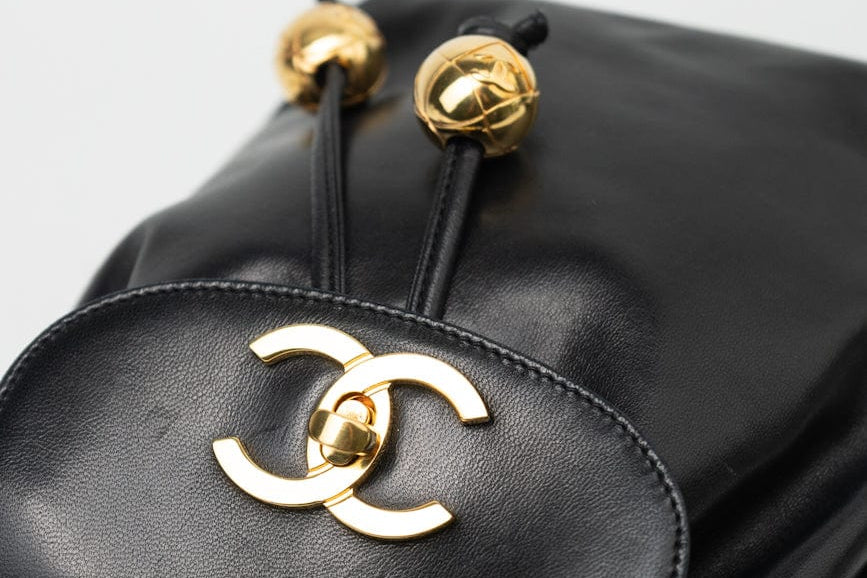 CHANEL Crossbody Vintage Black Lambskin Drawstring Cross Body Bag Gold Hardware - Redeluxe