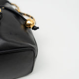 CHANEL Crossbody Vintage Black Lambskin Drawstring Cross Body Bag Gold Hardware - Redeluxe