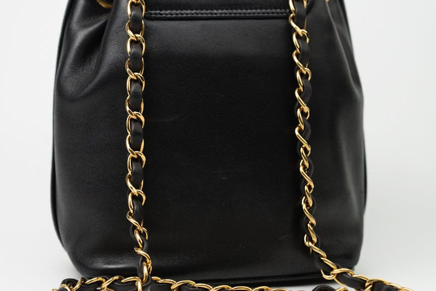 CHANEL Crossbody Vintage Black Lambskin Drawstring Cross Body Bag Gold Hardware - Redeluxe