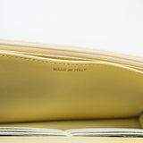 CHANEL Crossbody Yellow 23S Iridescent Yellow Lambskin Quilted Wallet On Chain (WOC) Light Gold Hardware - Redeluxe