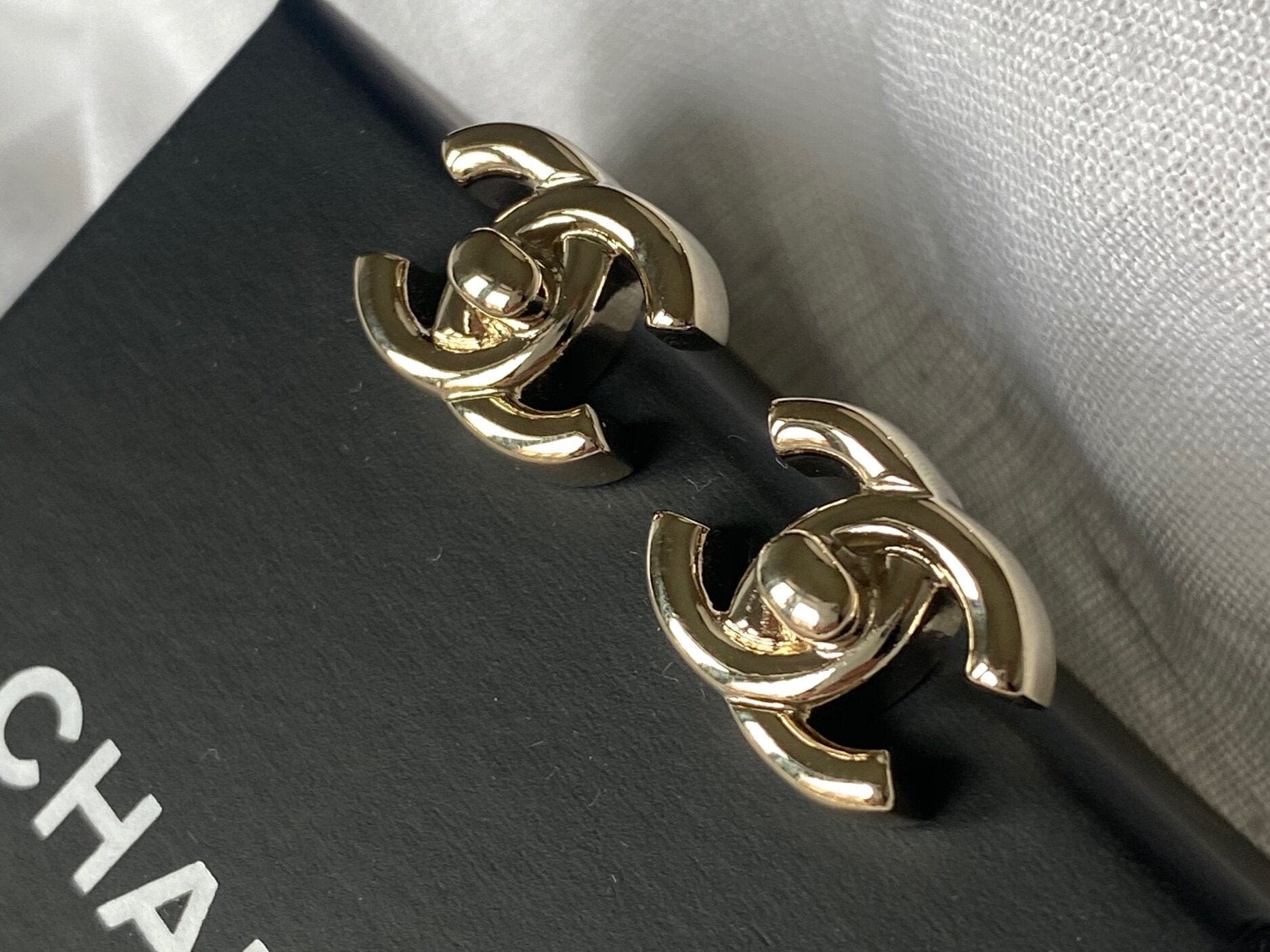CHANEL Earrings Chanel CC Turnlock Earrings Light Gold - Redeluxe