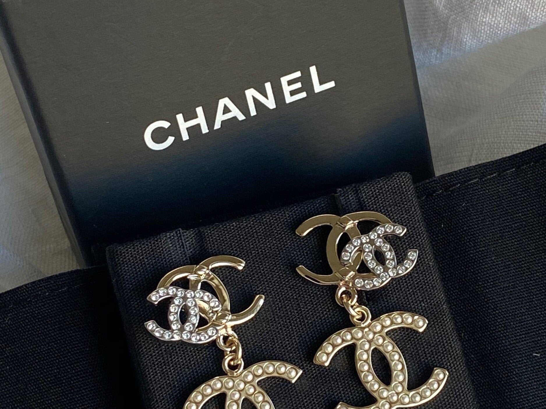 CHANEL Earrings Chanel Triple CC Pearly White Earrings Light Gold and Silver - Redeluxe