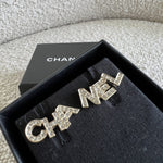 CHANEL Earrings Gold Cha-Nel Earrings - Redeluxe