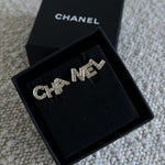 CHANEL Earrings Gold Cha-Nel Earrings - Redeluxe