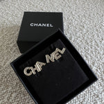 CHANEL Earrings Gold Cha-Nel Earrings - Redeluxe