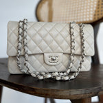 CHANEL Handbag 20B Ivory Caviar Quilted Classic Flap Medium Silver Hardware - Redeluxe