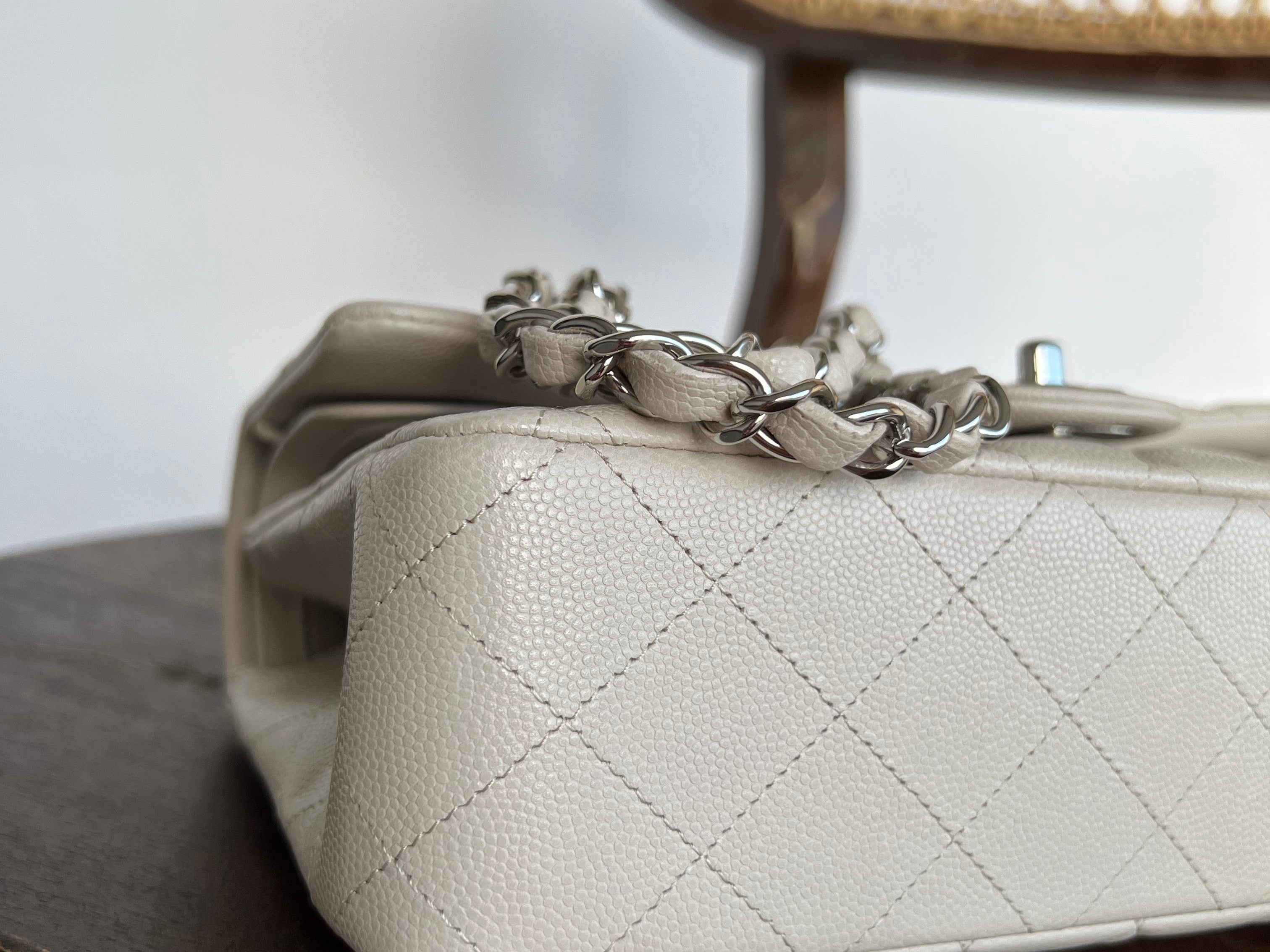 CHANEL Handbag 20B Ivory Caviar Quilted Classic Flap Medium Silver Hardware - Redeluxe