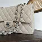 CHANEL Handbag 20B Ivory Caviar Quilted Classic Flap Medium Silver Hardware - Redeluxe