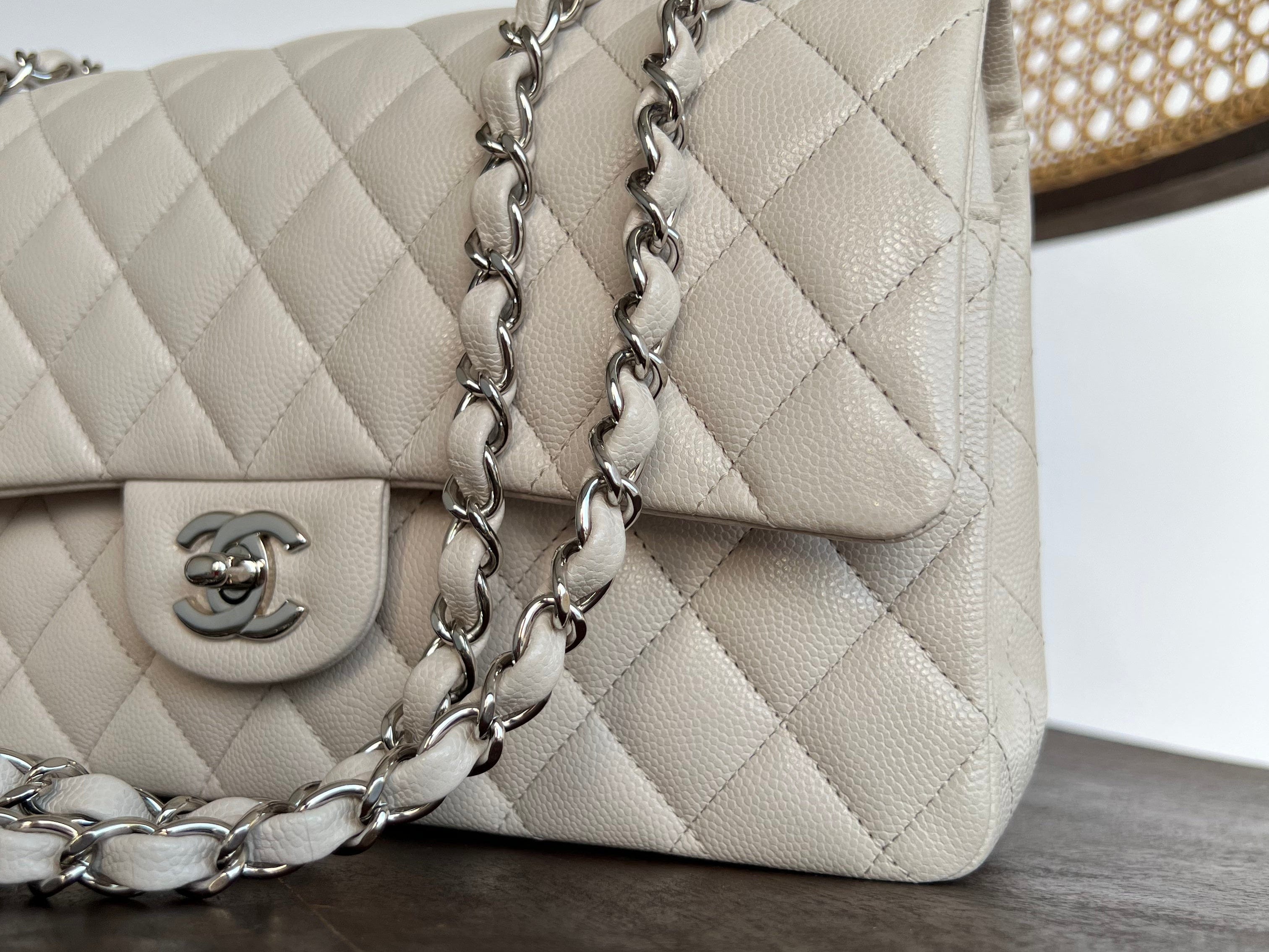 CHANEL Handbag 20B Ivory Caviar Quilted Classic Flap Medium Silver Hardware - Redeluxe