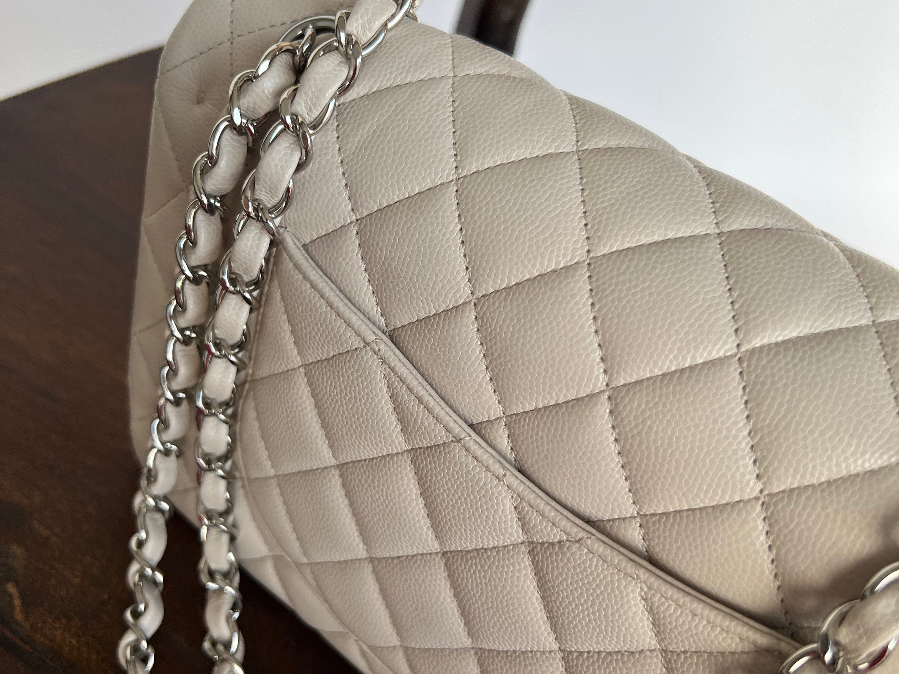 CHANEL Handbag 20B Ivory Caviar Quilted Classic Flap Medium Silver Hardware - Redeluxe