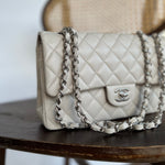 CHANEL Handbag 20B Ivory Caviar Quilted Classic Flap Medium Silver Hardware - Redeluxe