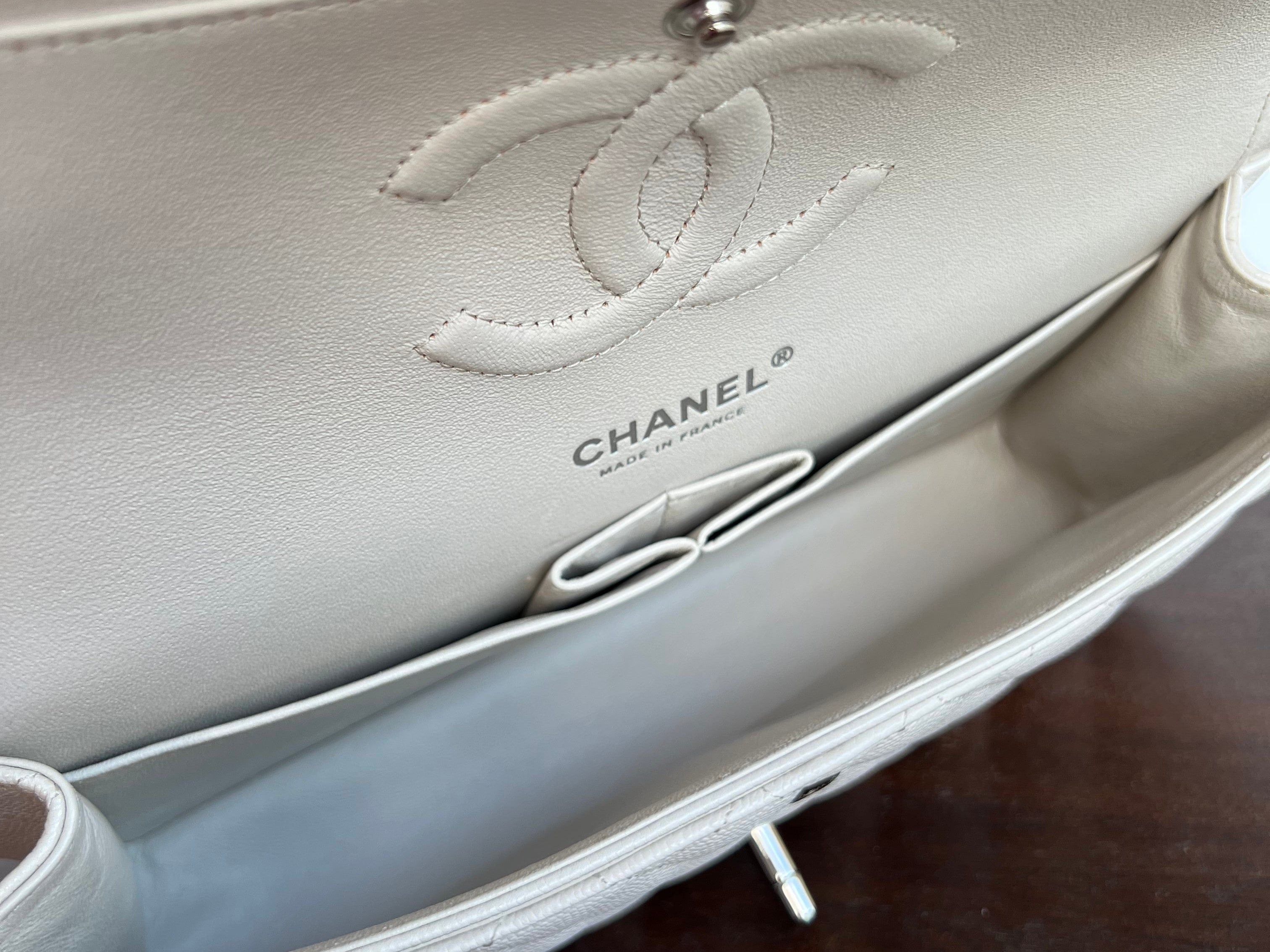 CHANEL Handbag 20B Ivory Caviar Quilted Classic Flap Medium Silver Hardware - Redeluxe