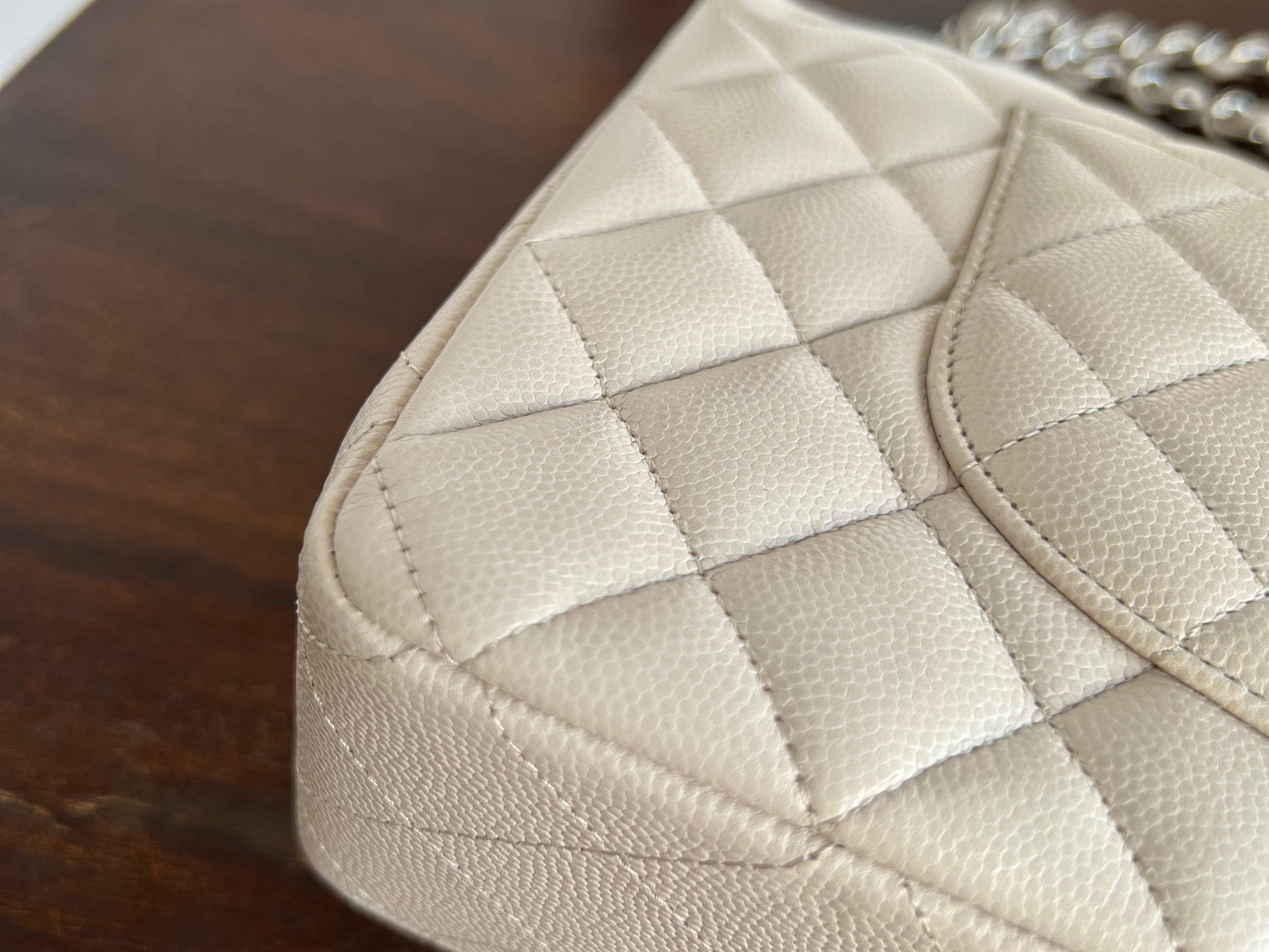 CHANEL Handbag 20B Ivory Caviar Quilted Classic Flap Medium Silver Hardware - Redeluxe