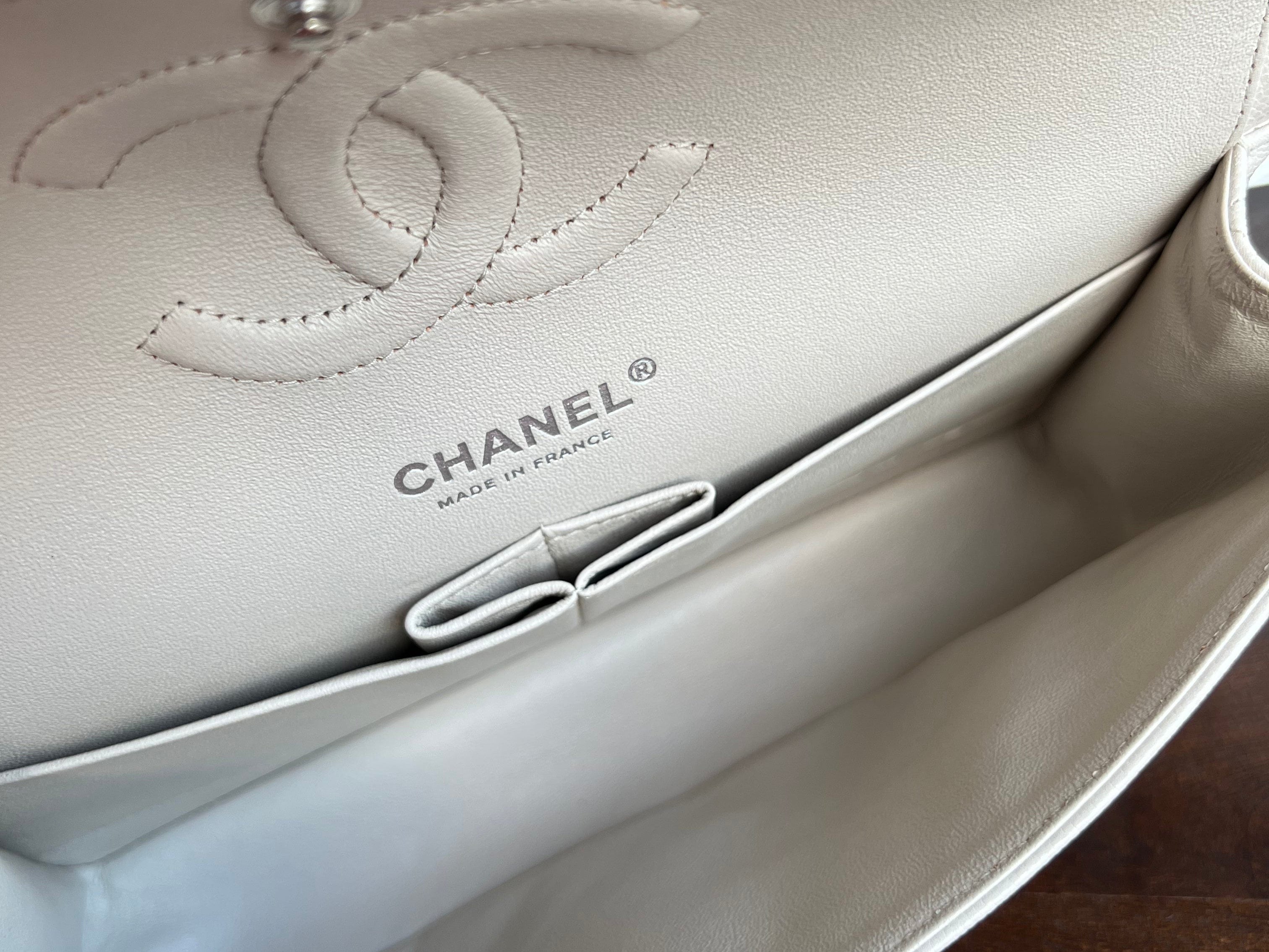 CHANEL Handbag 20B Ivory Caviar Quilted Classic Flap Medium Silver Hardware - Redeluxe