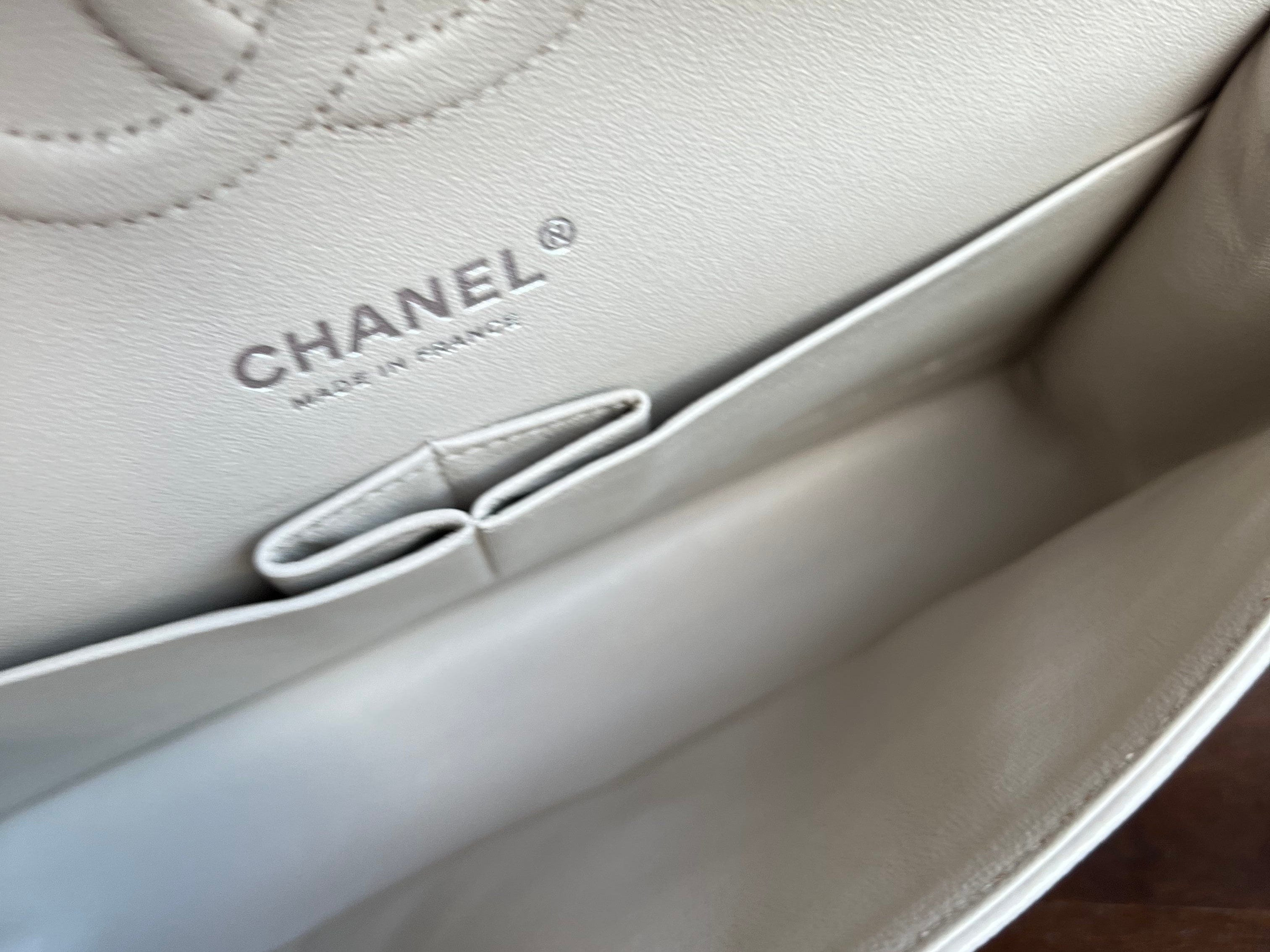 CHANEL Handbag 20B Ivory Caviar Quilted Classic Flap Medium Silver Hardware - Redeluxe