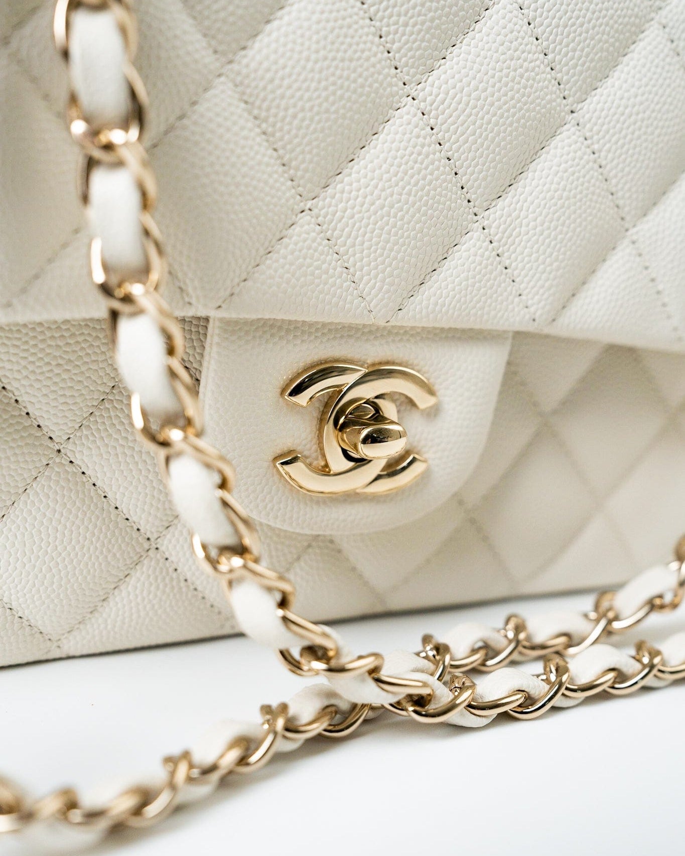 CHANEL Handbag 21A White/ Ivory Caviar Quilted Classic Flap Medium Light Gold Hardware - Redeluxe