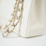 CHANEL Handbag 21A White/ Ivory Caviar Quilted Classic Flap Medium Light Gold Hardware - Redeluxe