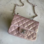 CHANEL Handbag 21K Mini Pink Iridescent Square Lambskin Quilted Classic Flap SHW - Redeluxe