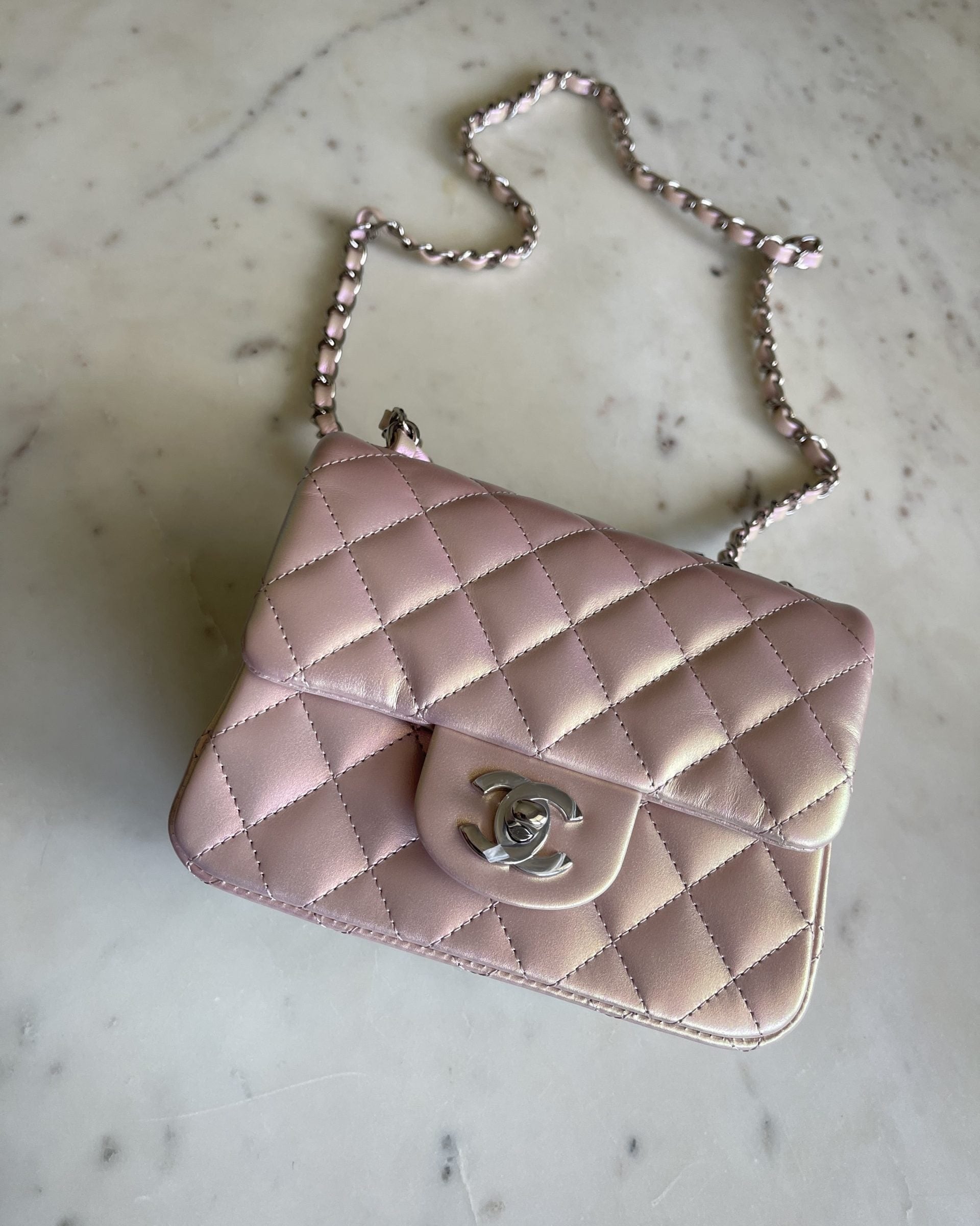 CHANEL Handbag 21K Mini Pink Iridescent Square Lambskin Quilted Classic Flap SHW - Redeluxe