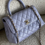 CHANEL Handbag 21K Quilted Coco Handle Lilac Caviar Small LGHW - Redeluxe