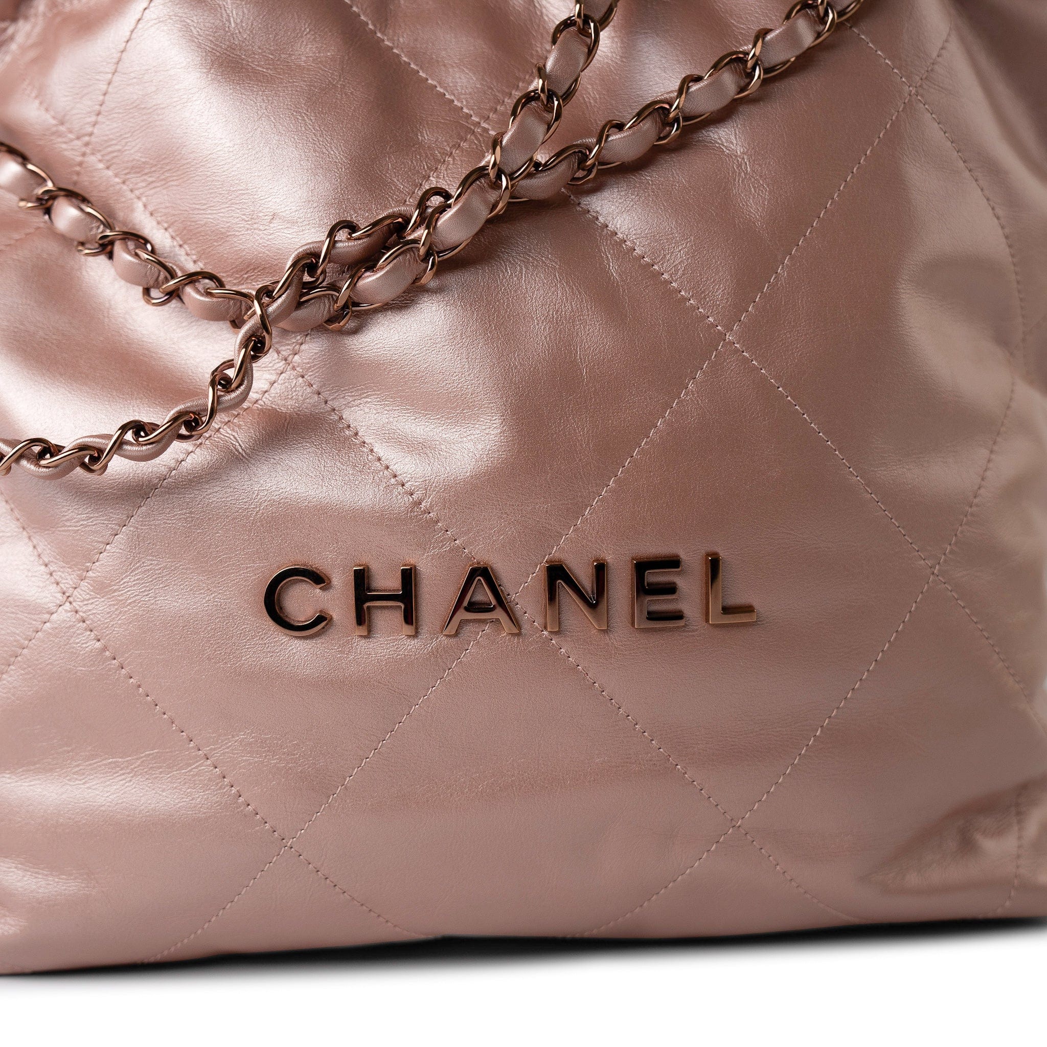 CHANEL Handbag 22A Metallic Pink / Rose Calfskin Quilted 22 Bag Drawstring Bag Small Rose Gold Hardware - Redeluxe
