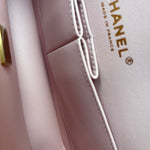CHANEL Handbag 22B Rose Claire/ light pink Caviar Quilted Classic Double Flap Medium Light Gold Hardware - Redeluxe