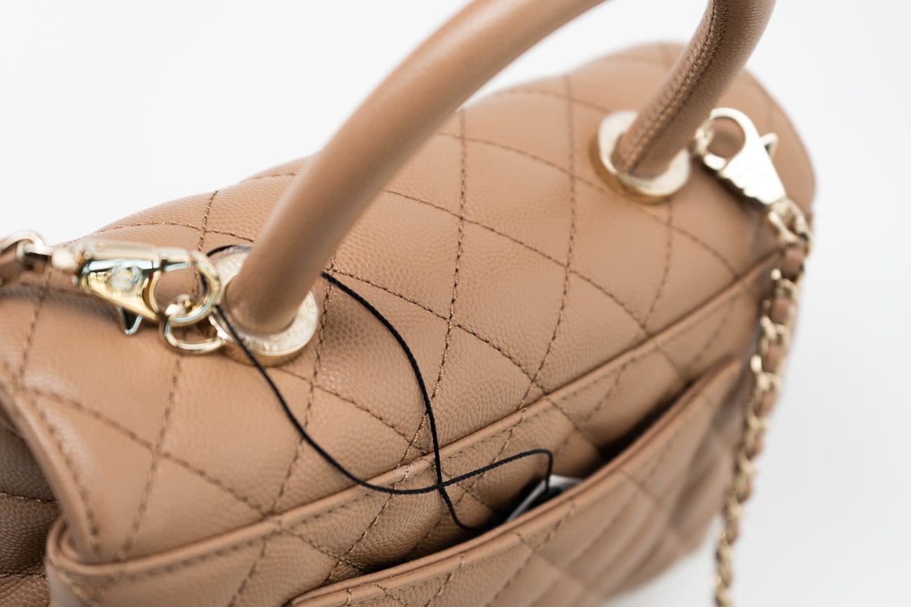 CHANEL Handbag 22K Dark Beige Caviar Quilted Coco Handle Small LGHW - Redeluxe