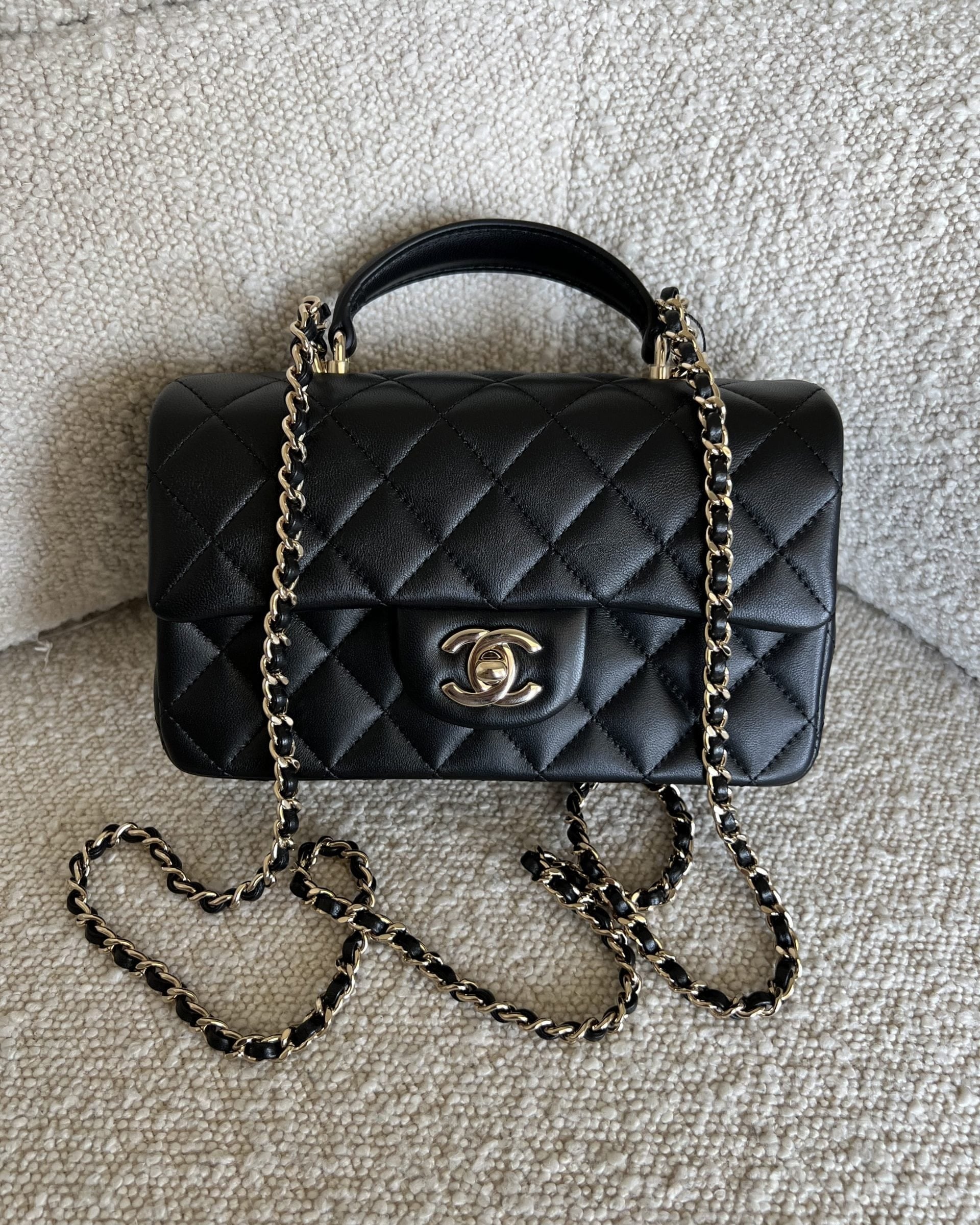 CHANEL Handbag 22P Black Lambskin Quilted Mini Top Handle LGHW - Redeluxe