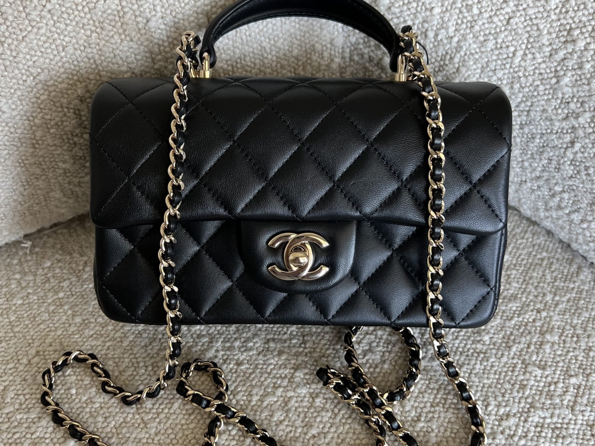 CHANEL Handbag 22P Black Lambskin Quilted Mini Top Handle LGHW - Redeluxe