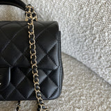 CHANEL Handbag 22P Black Lambskin Quilted Mini Top Handle LGHW - Redeluxe