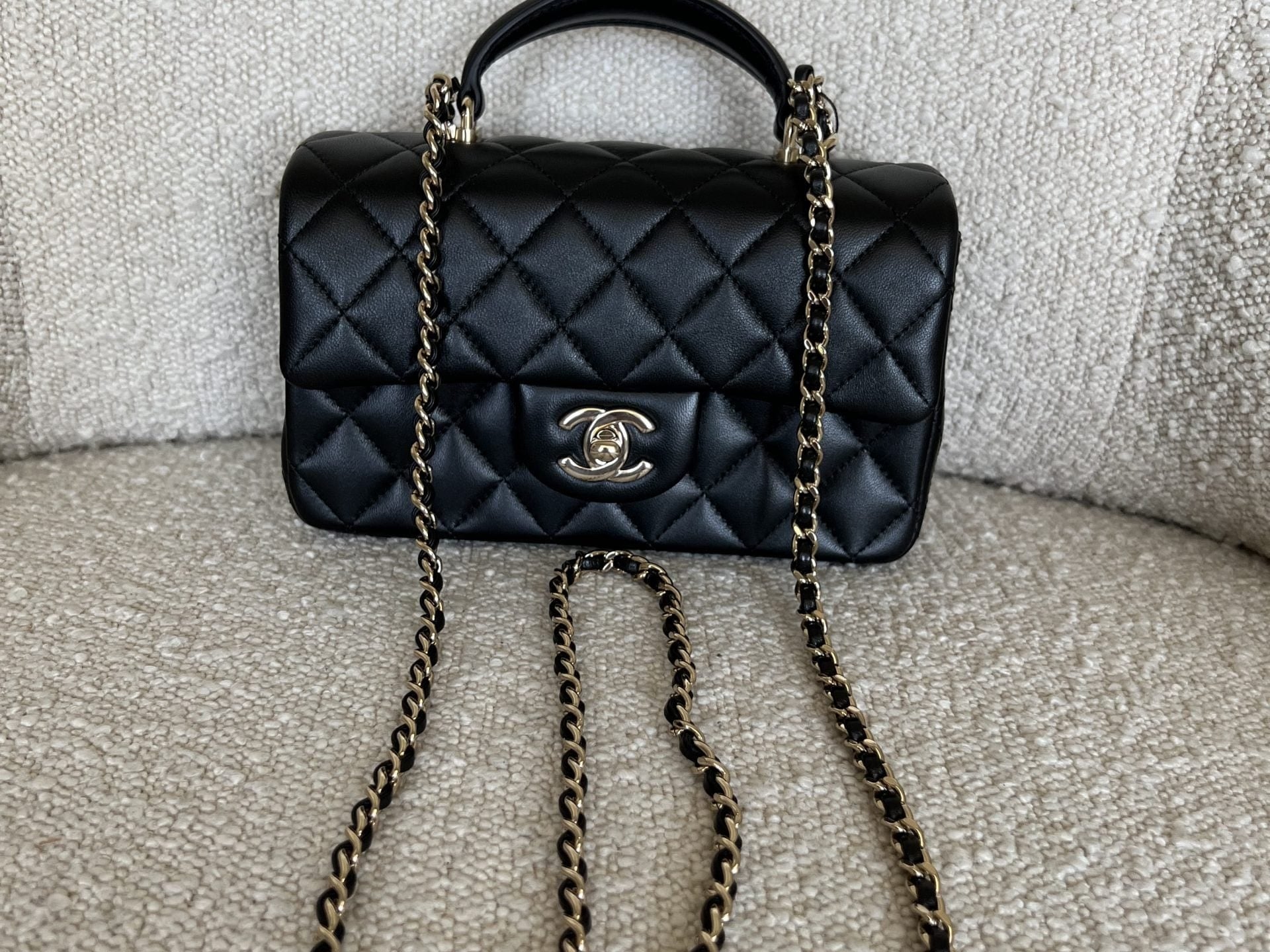CHANEL Handbag 22P Black Lambskin Quilted Mini Top Handle LGHW - Redeluxe
