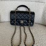 CHANEL Handbag 22P Black Lambskin Quilted Mini Top Handle LGHW - Redeluxe