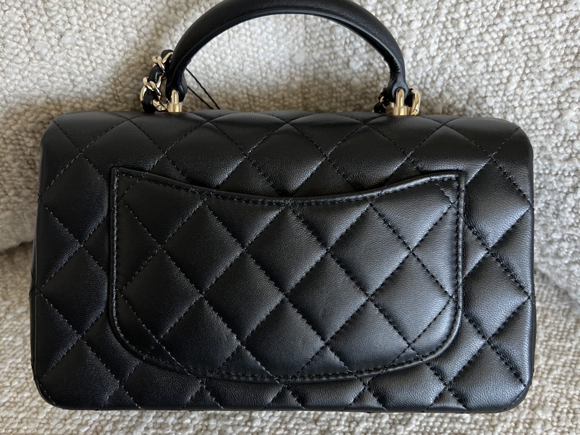 CHANEL Handbag 22P Black Lambskin Quilted Mini Top Handle LGHW - Redeluxe