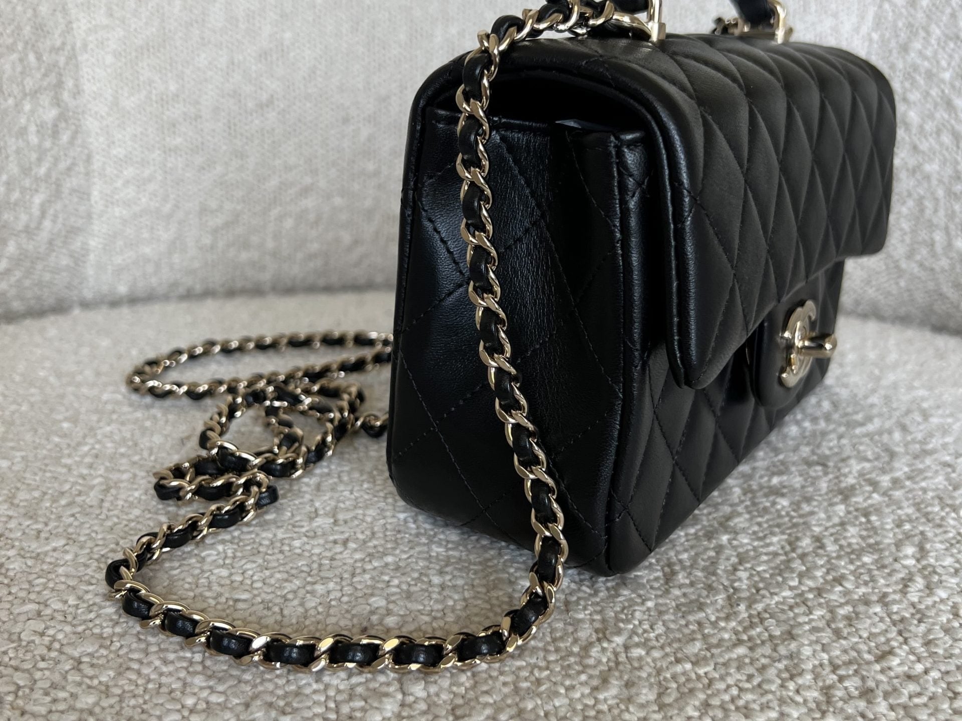 CHANEL Handbag 22P Black Lambskin Quilted Mini Top Handle LGHW - Redeluxe