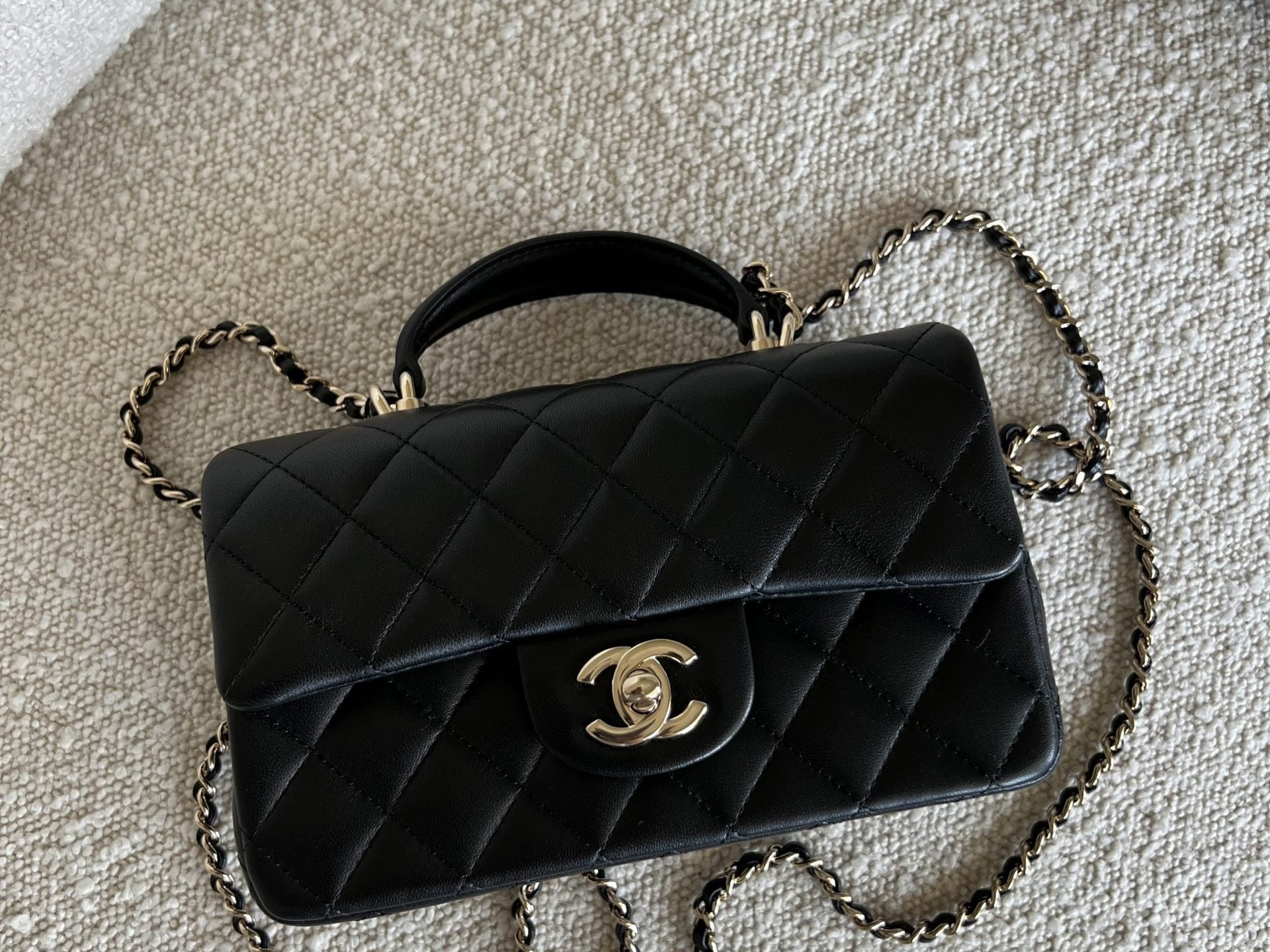 CHANEL Handbag 22P Black Lambskin Quilted Mini Top Handle LGHW - Redeluxe