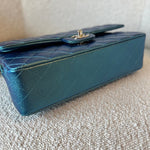 CHANEL Handbag 22P Iridescent Green Caviar Quilted Classic Flap Medium Light Gold Hardware - Redeluxe
