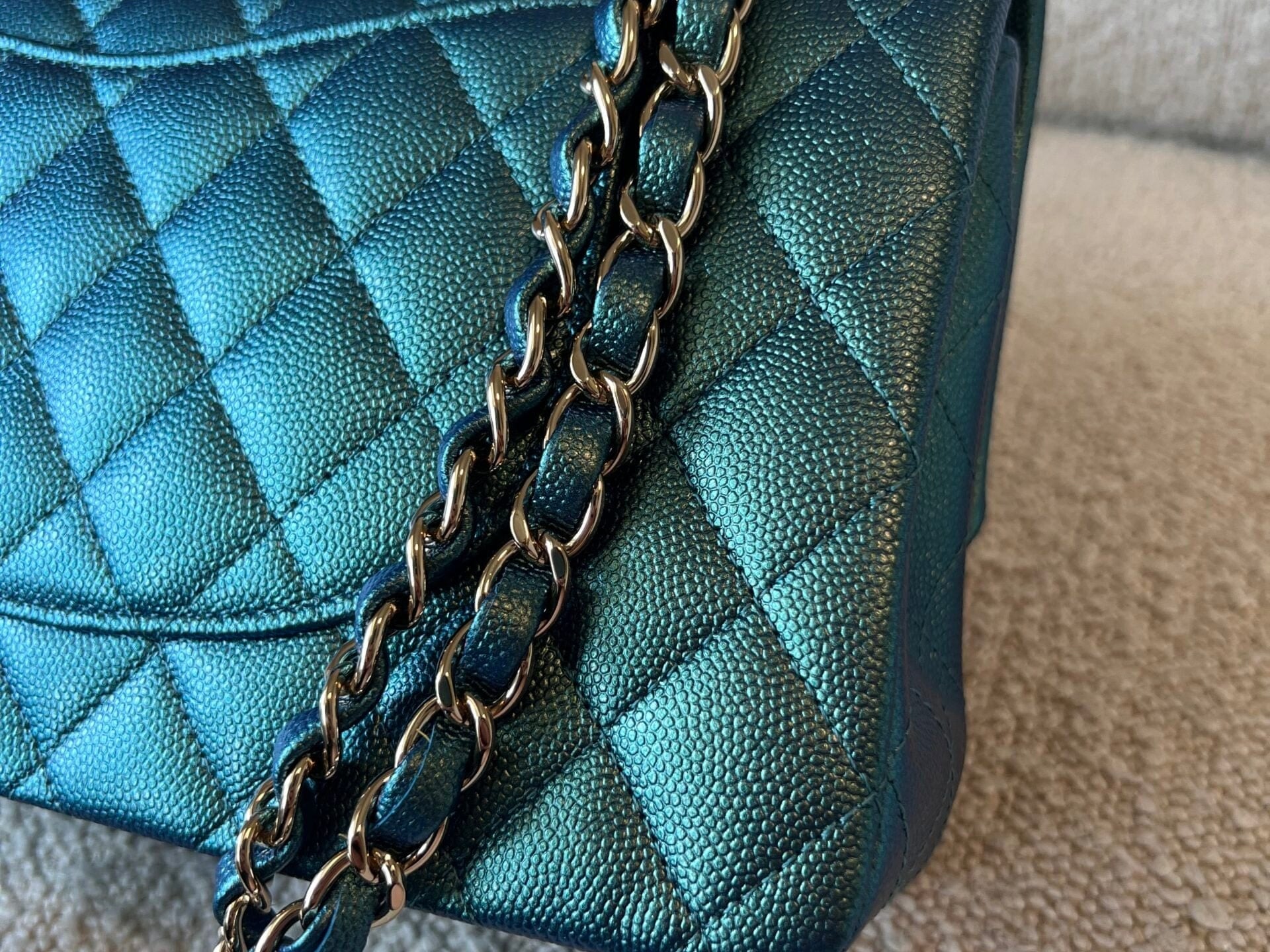 CHANEL Handbag 22P Iridescent Green Caviar Quilted Classic Flap Medium Light Gold Hardware - Redeluxe