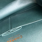 CHANEL Handbag 22P Iridescent Green Caviar Quilted Classic Flap Medium Light Gold Hardware - Redeluxe