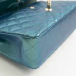 CHANEL Handbag 22P Iridescent Green Caviar Quilted Classic Flap Medium Light Gold Hardware - Redeluxe