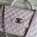 CHANEL Handbag 22P Light Pink Caviar Quilted Coco Handle Medium LGHW - Redeluxe