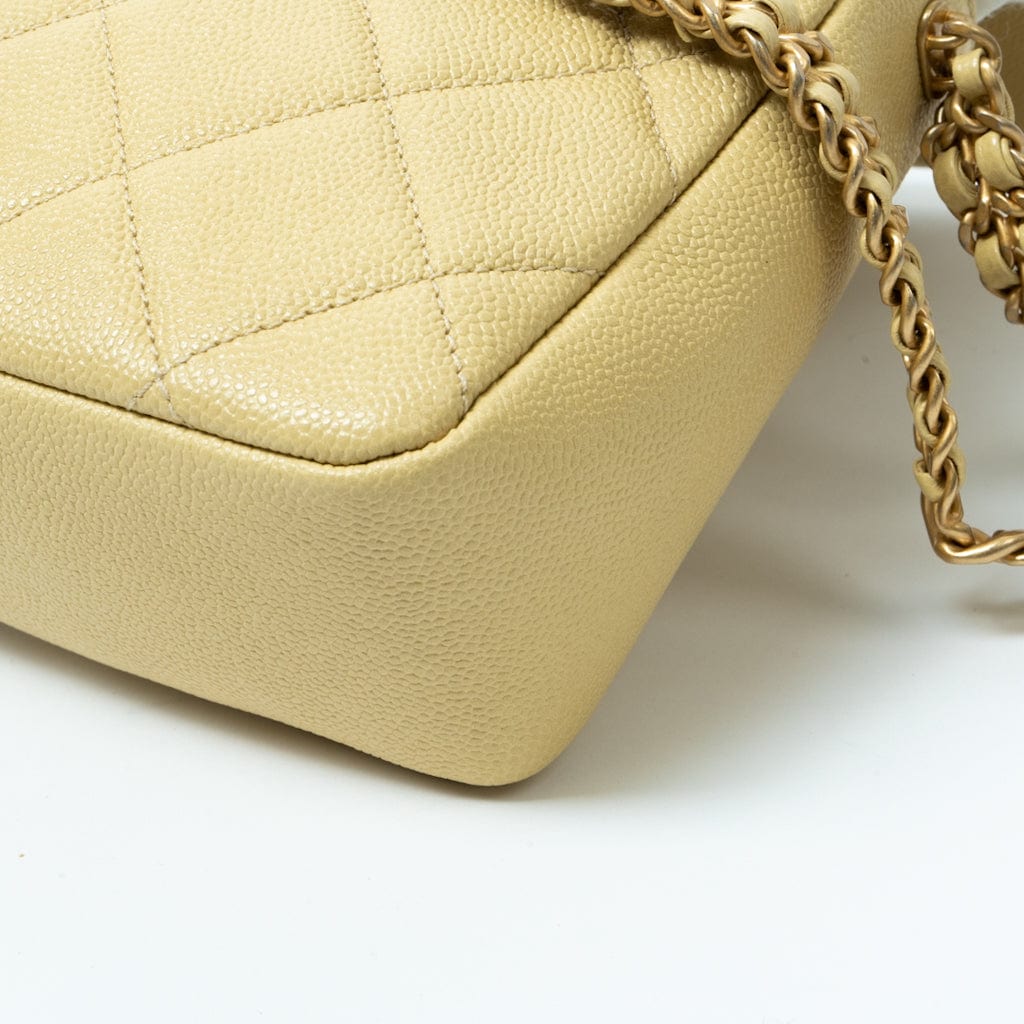 CHANEL Handbag 22P Shiny Yellow Caviar Quilted Small Chain Melody Flap - Redeluxe