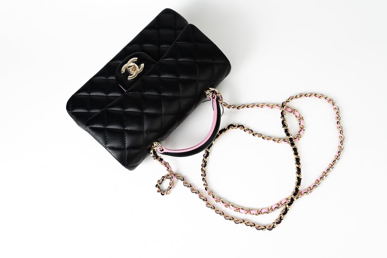 CHANEL Handbag 23P Mini Top Handle Black/Pink Lambskin Quilted w/ Light Gold Hardware - Redeluxe