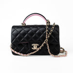 CHANEL Handbag 23P Mini Top Handle Black/Pink Lambskin Quilted w/ Light Gold Hardware - Redeluxe